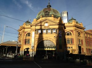 The cathedral casting a shadow on Flinders St Station