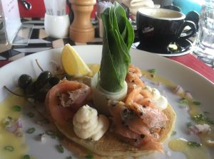 Spring onion blini with gravlax and sour cream